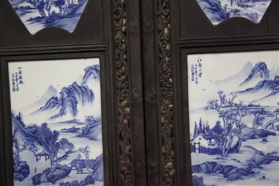 A set of four Chinese blue and white porcelain mounted wood panels, 121.5 x 38cm
